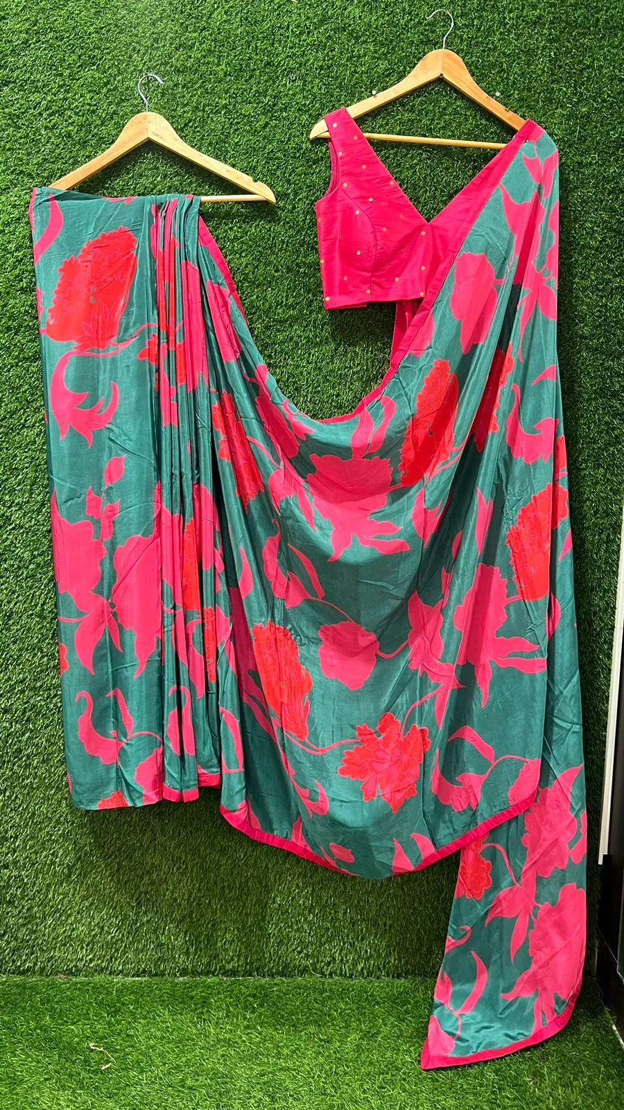Peacock blue floral modal saree with pink hand work blouse